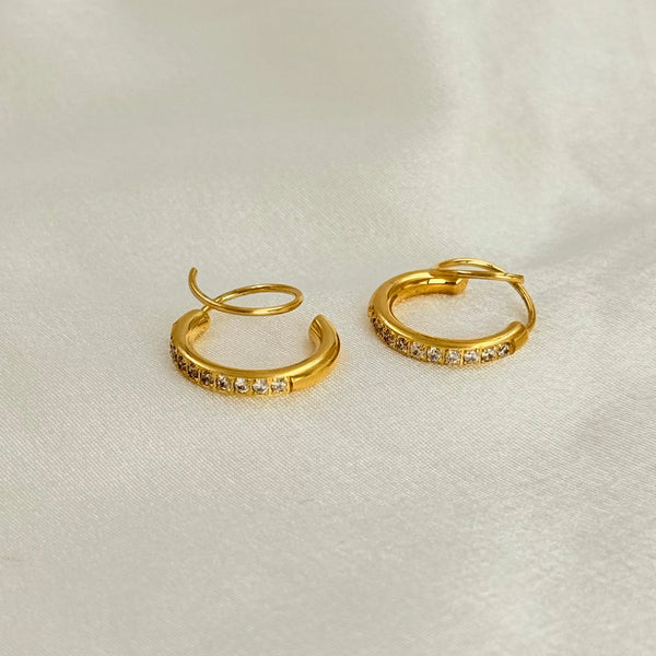 Golden spiral hug earrings