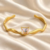 Aurora Solitaire Wave Gold Kada
