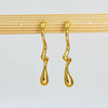 Wavy gild hoops earrings