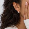 Golden spiral hug earrings