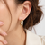 Single diamond hoop earrings